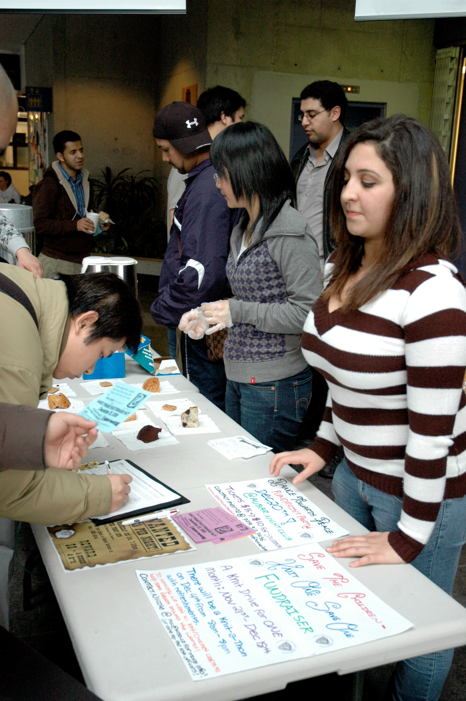 The KSA's Meirna Said asks students to sign a petition for more student space. (Joseph Gloria photo)