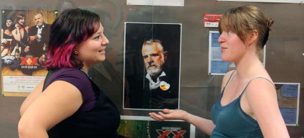 KSA members Vanessa Knight and Catherine Wilkinson discuss the Most Interesting Man in the World at the Surrey campus on Thursday. (Jacob Zinn photo)