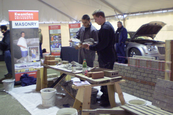Two masonry students show off their craft in the Trades tent at Kwantlen';s Big Big Open House.