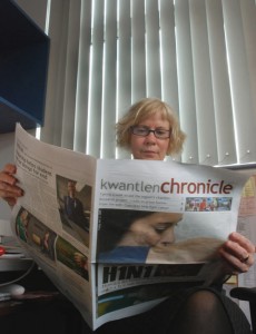Beverley Sinclair, chair of Kwantlen's Journalism program, soaks in the latest issue of the Chronicle, which as of 2011 will be based in Surrey.