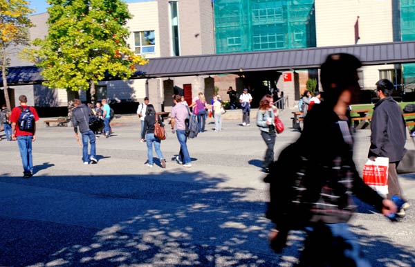 Students bustle between classes at Kwantlen's Surrey campus, which is busier this year because of a 10 per cent increase in student enrolment in the institution's university studies. (Sarah Jackson photo)