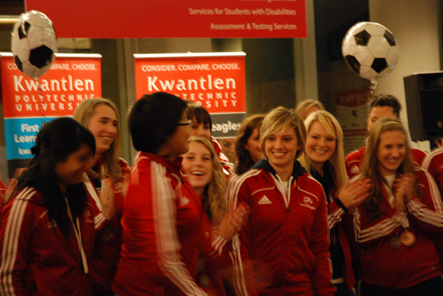 The Kwantlen Eagles woman's soccer team are greeted with a huge round of applause.