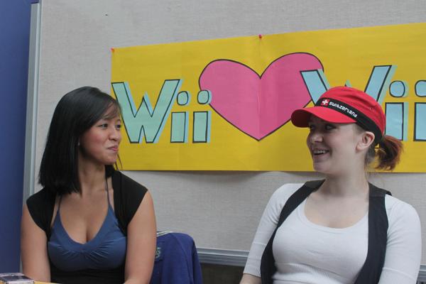 Ivy Mendoza and Heather Poirier ran the sign-up booth for the Wii tournament, which the KSA hopes will get Richmond students involved in recreation. (Jacob Zinn photo)